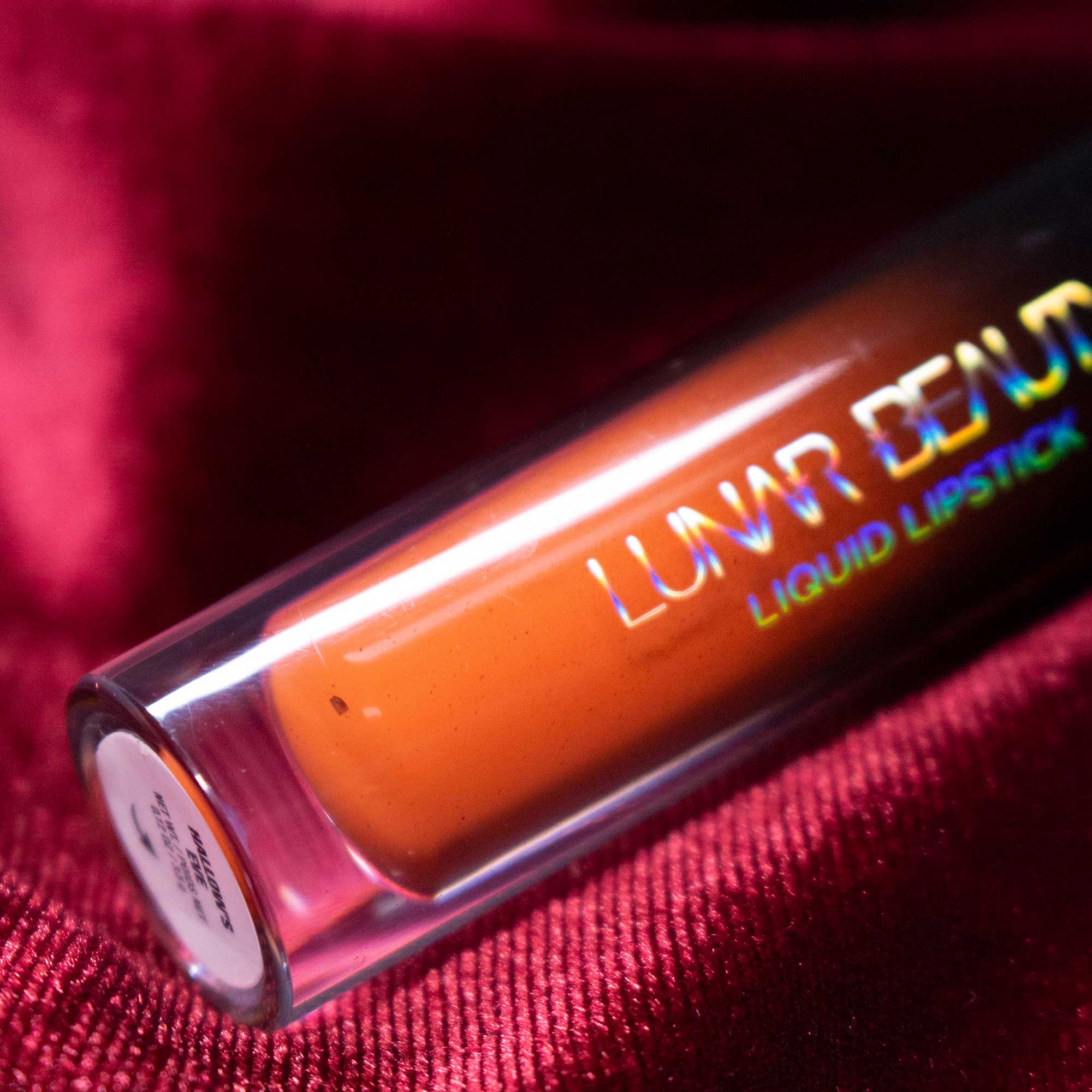 Lunar Beauty Hallows Eve Liquid Lipstick in spicy pumpkin orange lip