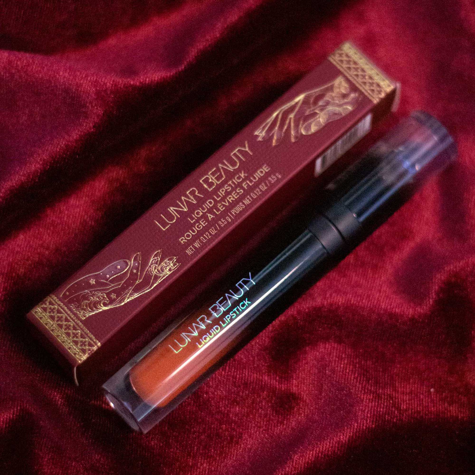 Lunar Beauty Hallows Eve Liquid Lipstick in spicy pumpkin orange halloween