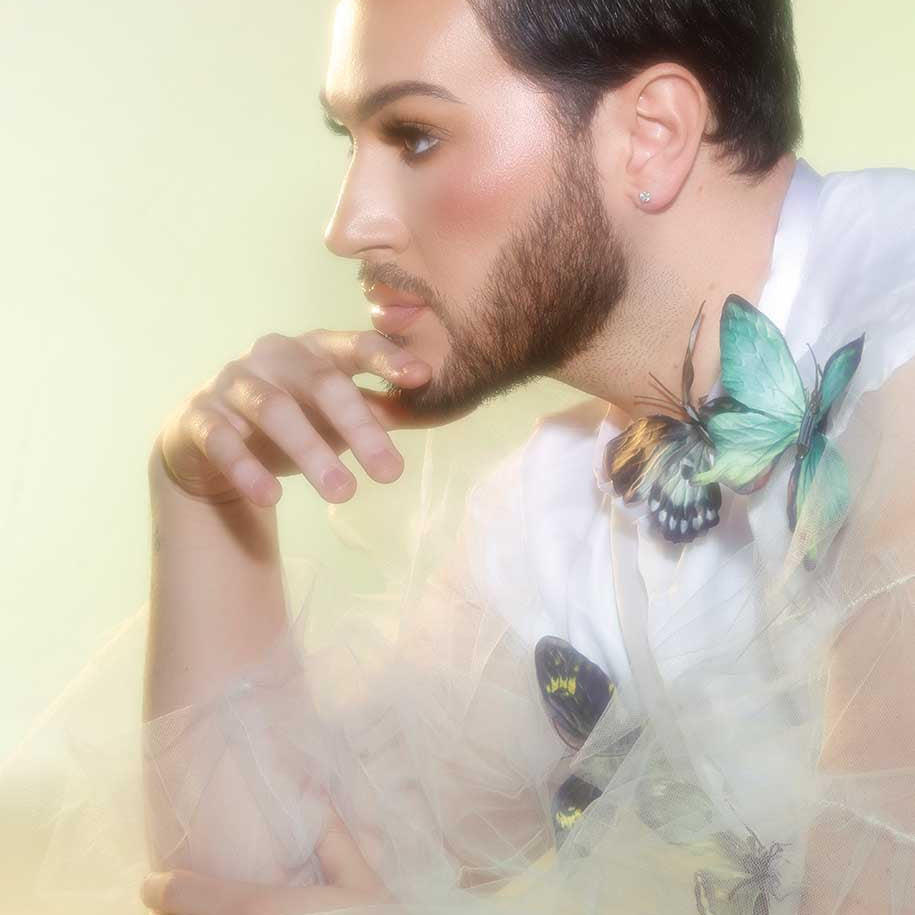 makeup artist and Lunar beauty founder Manny mua wearing Moonshroom highlighter palette 